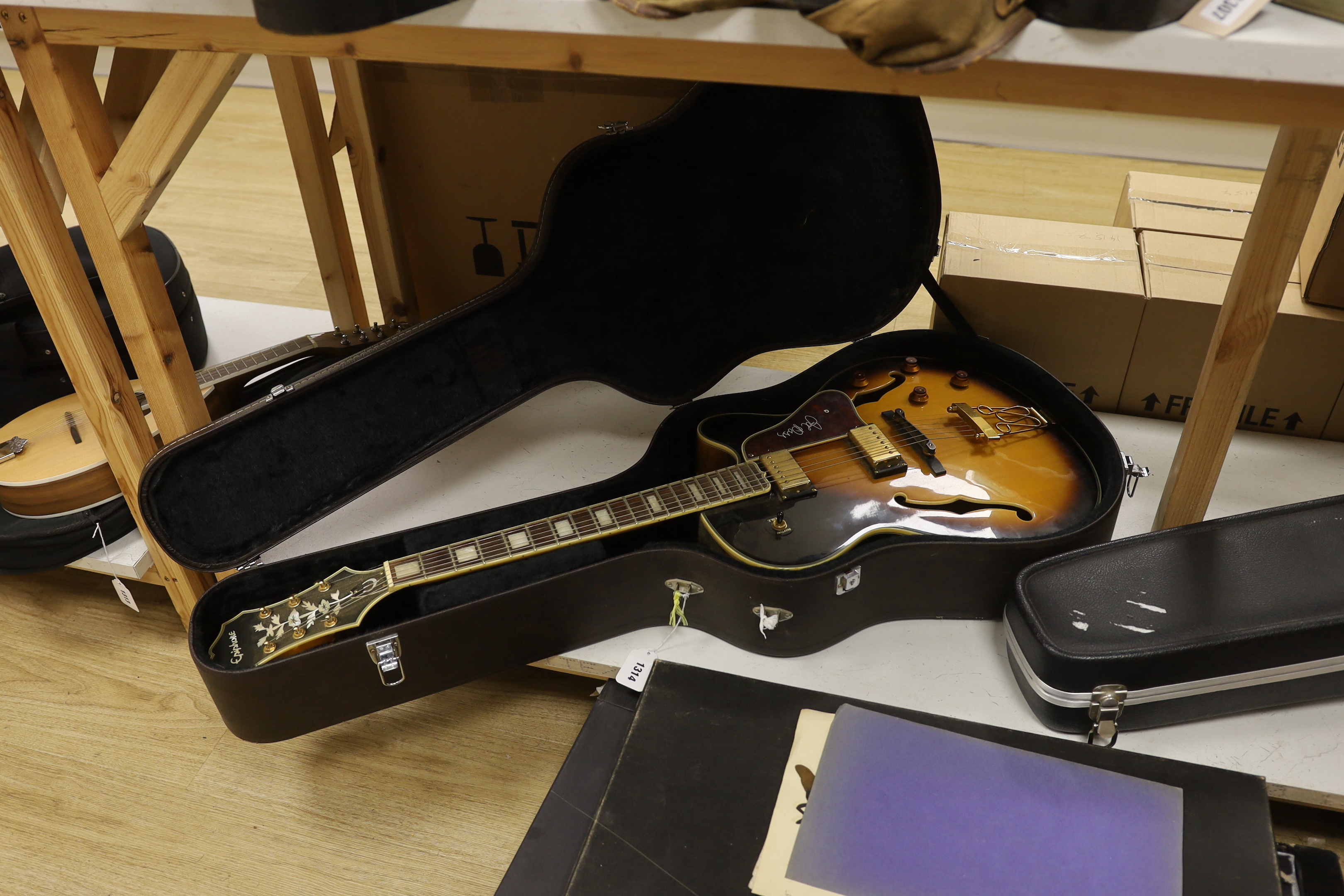 An Epiphone Joe Pass signature Emperor II guitar in hard case